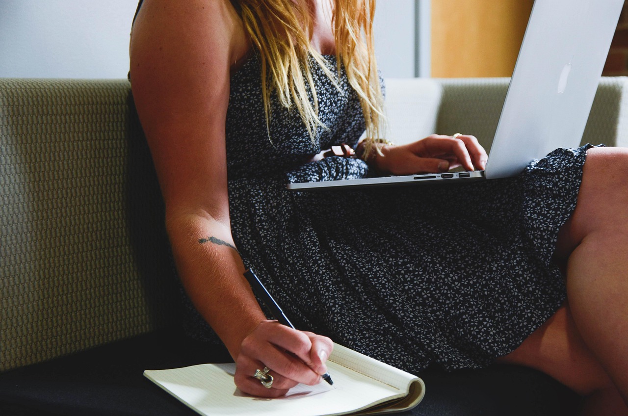 Freelancer creating a tax invoice on a computer